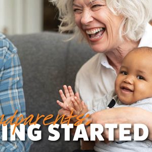 Grandparents holding baby