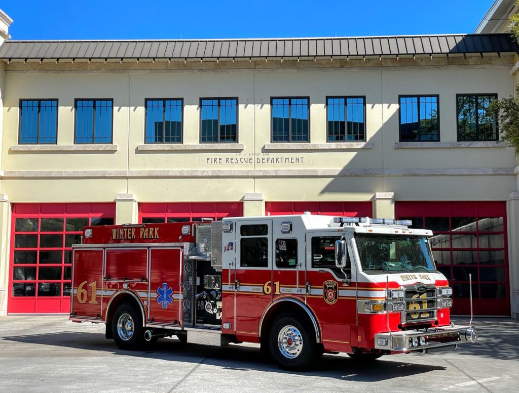 Picture of Engine 61 emergency response fire apparatus parked in front of Station 61